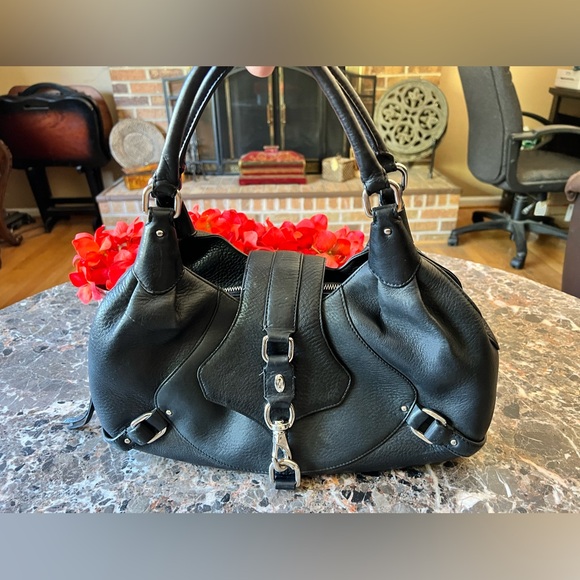 Cole Haan Handbags - Ladies Cole Haan black gorgeous genuine leather satchel with 3 sections